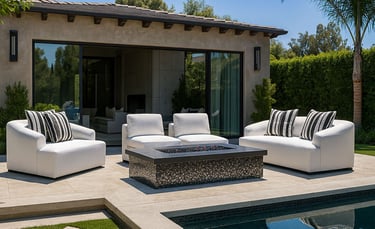 Elegant white sofa set by Solo Home Decor near a pool with striped pillows, showcasing a modern luxury backyard design.