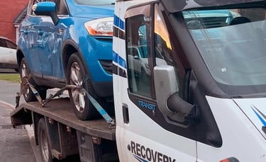 alt="DVLA paperwork being handled during scrap collection in Droitwich"