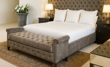 Tufted bed and bench with dark wall paneling, custom-designed by Solo Home Decor for a luxe bedroom.