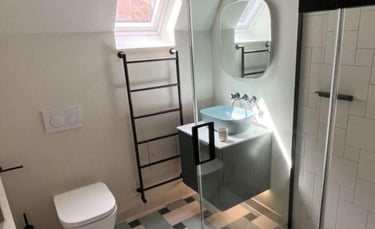 Vertical designer radiator installed in Worcester property for style and warmth