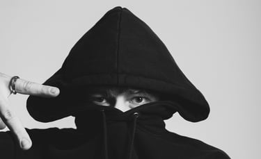 portrait of a man in a black hoodie with a hoodie on