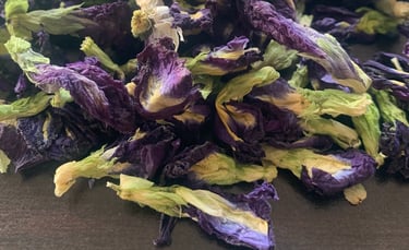a pile of dried blue butterfly pea flower petals