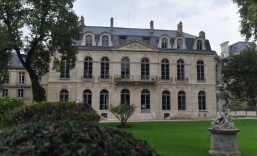 Elegant facade of the Musee Rodin in Paris with classic French architecture and garden sculptures.