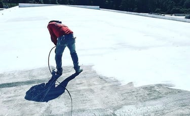 coating or spraying a roof coating rubber system
