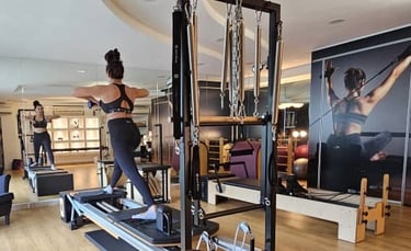 Pilates practitioner using tower equipment at The Pilates Room Bangsar