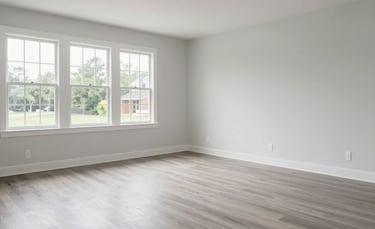 Interior of a modern suburban Virginia home, bright natural light, minimalist furniture, perfectly clean light gray hardwood floors, wide angle, professional photography, high-end residential atmosphere.