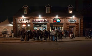 Outside of Ragtag Cinema with a crowd of people gathered 