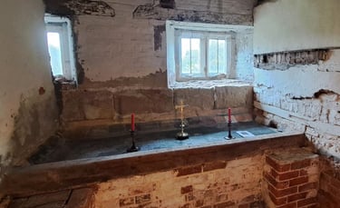 The basement of Soulton Hall. The small room holds the altar stone of the old St Paul's Cathedral