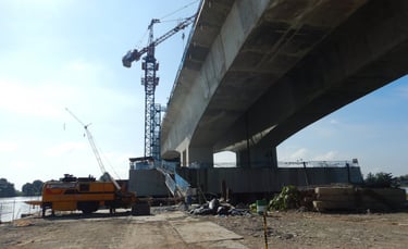 a crane is being built over a bridge