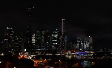 a city skyline with a bridge and a city skyline