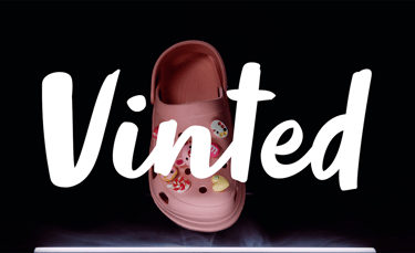 a pair of pink shoes with a pink flowered shoe