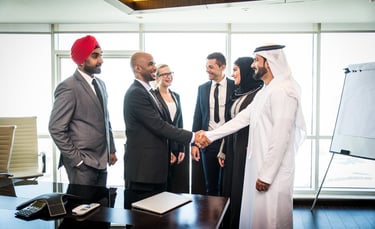 Business People Shaking Hands at a Meeting