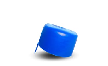 a blue plastic bottle with a blue cap on it