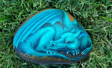 rock painted like a dragon