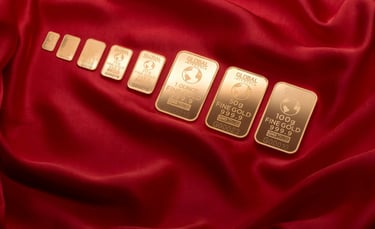 gold bars layed out in a row symbolizing blog post augusta precious metals, a gold ira company and why you should choose them