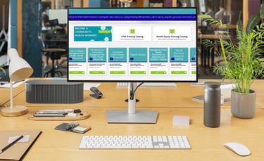 a computer monitor screen showing a desktop computer monitor and keyboard