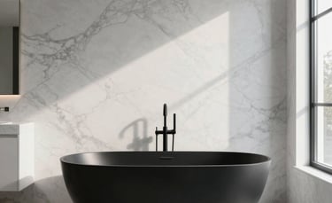 A high-end North American master bathroom renovation featuring a matte black freestanding bathtub against a white marble wall. Soft natural light streams through a large window, minimalist luxury design with clean architectural lines.