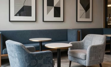 An aesthetic interior shot of a modern study lounge with comfortable chairs and minimalist art, featuring geometric patterns in slate blue and light gray, Middle Eastern atmosphere.