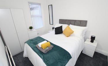 Double bedroom with white walls