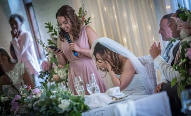 the bridesmaid giving a wedding speech