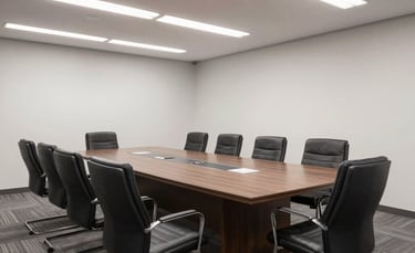 A sleek dark underwater scene showing a blue-lit subsea ROV gently exploring the ocean floor.