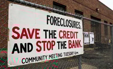 "Sign reading save the credit and stop the bank, representing foreclosure help from local real estate investors."