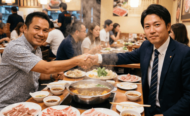 Professional business meeting at a hotpot event, featuring attendees networking and discussing trade partnerships.