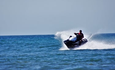Jet ski adventure on the open ocean during luxury catamaran tour in Papagayo, Costa Rica