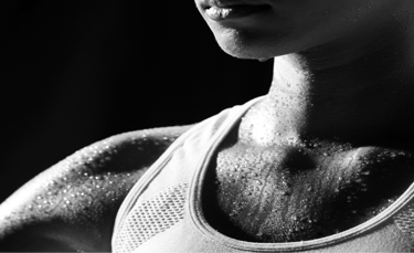 a woman with a black and white photo of her face and body