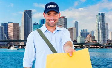 Un trabajador de JC Lino Movers entregando un sobre