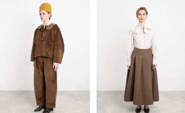 Rail of Cawley Studio garments in earthy, neutral tones