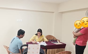 a man and woman sitting at a table with emoticions