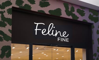 Feline Fine conceptual clothing store front with sleek branding and stylish window display.