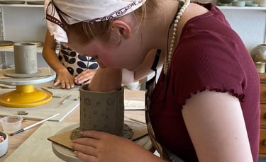 a woman in a red shirt and a woman in a red shirt