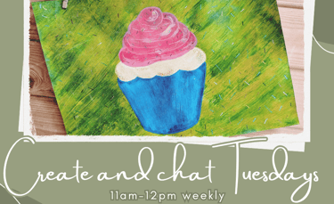 a cupcake with a pink and white cupcake on it