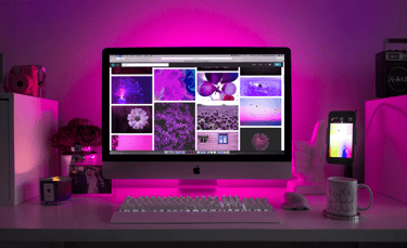 a computer monitor screen with a computer monitor and a keyboard
