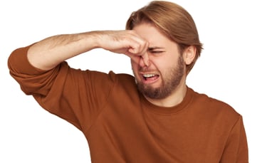 dog waste is stinky man reaction pinched nose