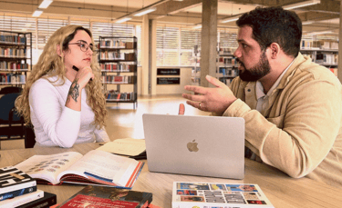 two people discussing a design project