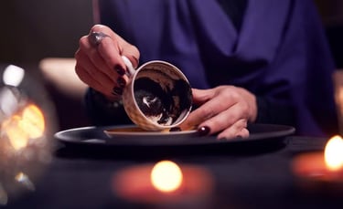 coffee grounds reading fortune telling in a cup