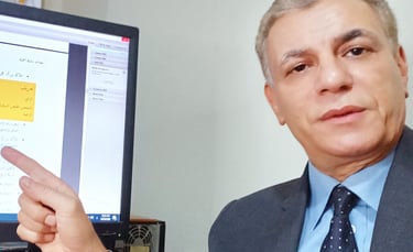 Major General Ayman Saydelahl pointing towards a strategic technical chart