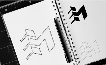 création à la main d'un logo d'entreprise d'architectes