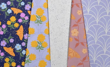 a variety of different colored fabric samples with flowers