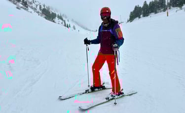 a guy skiing in alps mountains in austria