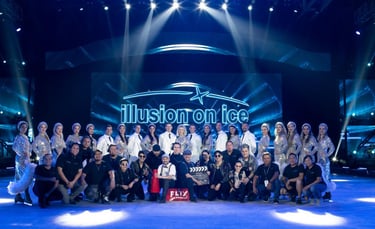 a group of people standing in front of a stage