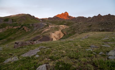 Wetterhorn Peak in sunrise alpenglow on a glorious summer morning