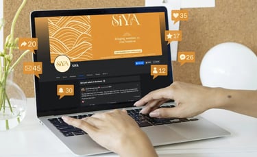 a person is using a laptop computer for social media management