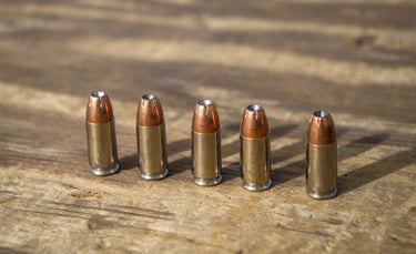 9mm ammo on a table displayed