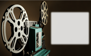 a movie projector with a screen