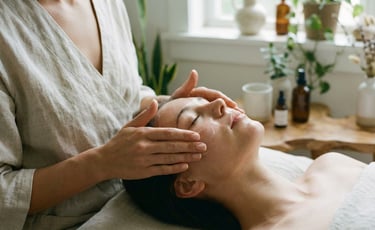 a woman is getting a facial massager