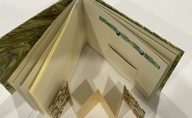 Album with marbled paper and decorative pages